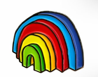 Rainbow pin by Meow Wolf Artist Luke Dorman