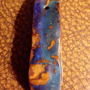Beautiful fire filled australian boulder opal pendant