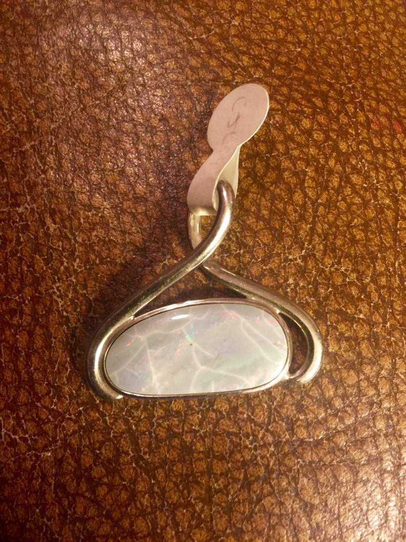 Elegant white fire filled opal pendant SALE