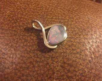 Sparkly fire filled opal pendant