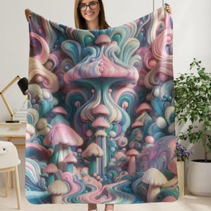 May include: A colorful blanket featuring a whimsical mushroom design in shades of pink, blue, and teal. The blanket showcases a fantasy landscape with stylized mushroom shapes and swirling patterns, creating a dreamy aesthetic.