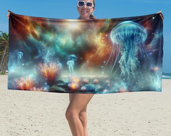 May include: A colourful beach towel featuring a galaxy and jellyfish design. The towel is made from soft, lightweight fabric and is ideal for relaxing on the beach or by the pool.