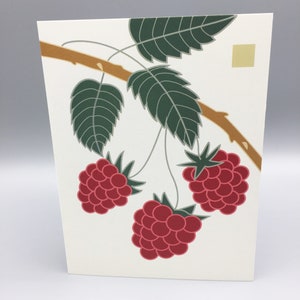 May include: A white card with a stylized illustration of a raspberry branch with three red raspberries and green leaves. The branch is brown and the background is white.