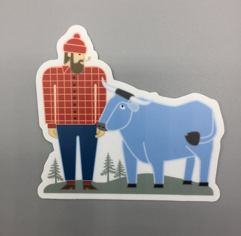 May include: A sticker featuring a cartoon illustration of a lumberjack wearing a red and black checked shirt, a red hat, and a beard, standing next to a blue ox.