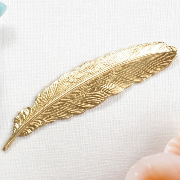 4 gold FEATHER jewelry embellishments. Raw brass stamping made in US. 53mm x 14mm (ST4c)