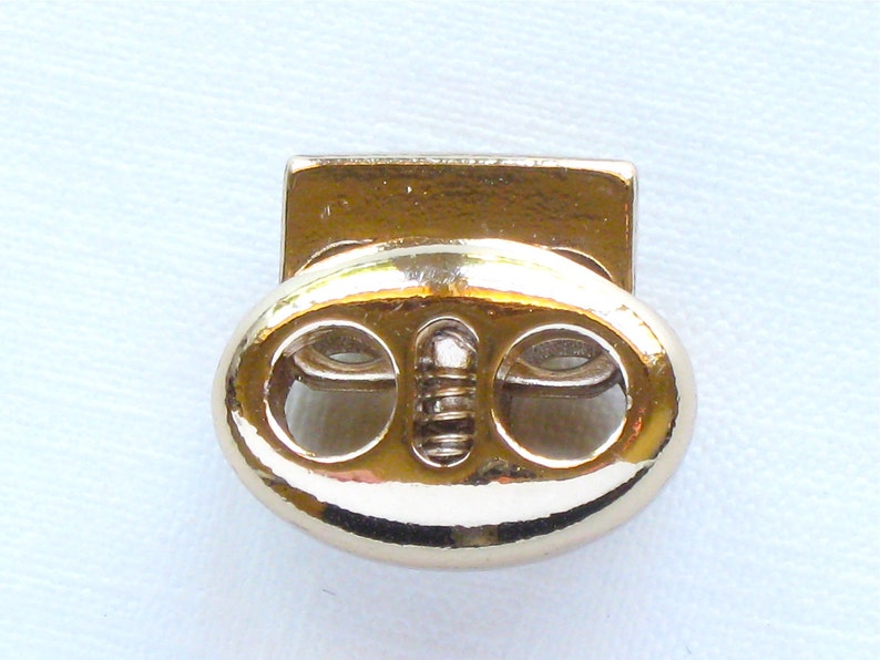 1 gold spring jewelry CLASP Fits 3mm leather cord or smaller.