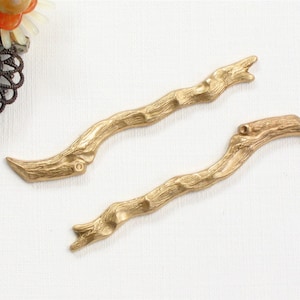gold brass TWIG branches jewelry embellishments. Solid piece with great detail. Almost 2 inches long. Stamping made in US. (ST47)