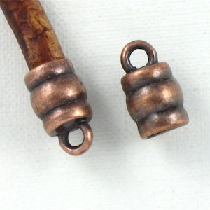 12 antique copper leather jewelry End Caps with loop . 4mm inside diameter (EC8ac)