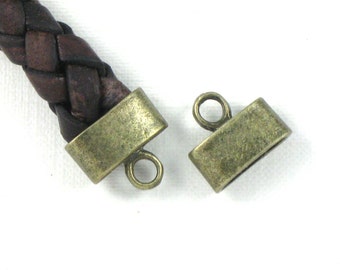 12 cord jewelry END CAPS in Antique Bronze . Large and Oval . 9mm x 3.5mm Hole (EC3ab)
