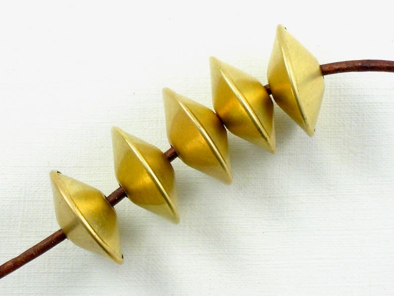 4 large saucer BEADS raw brass .75 inch wide with 2mm hole. These are so much fun to work with. image 1