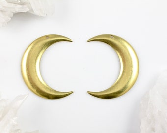 8 crescent moon jewelry pendant or earring pieces. 4 lefts and 4 rights. Raw brass stamping made in US. 33mm x 26mm (T49).