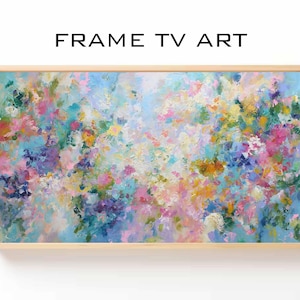 May include: A framed artwork for a TV screen, with an abstract floral design. The painting uses pink, blue, yellow, and purple hues. The text "FRAME TV ART" is displayed at the top of the frame.