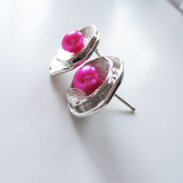 Lotus leaf and nestled pearl earrings.  Stud post style.  In silver and hot pink.