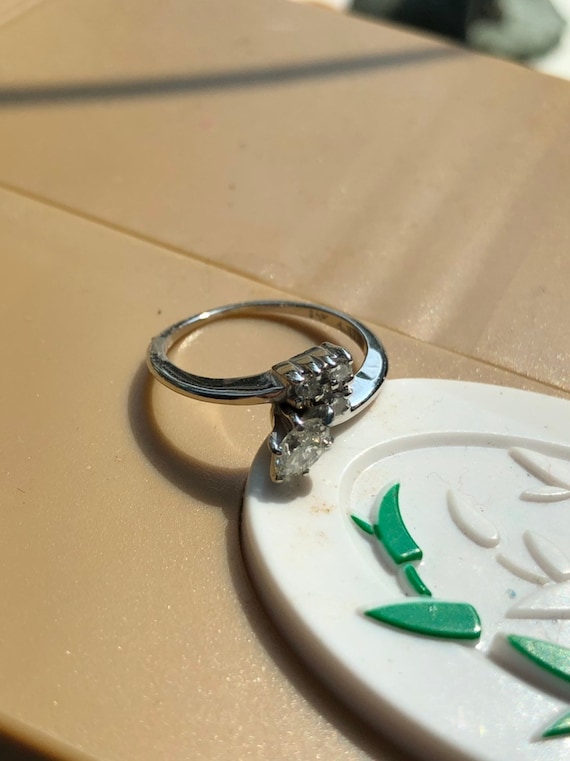 Minimalist diamond engagement ring