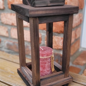 Wooden lantern in country house style, lantern, rustic, walnut colored, wood lantern, winter light