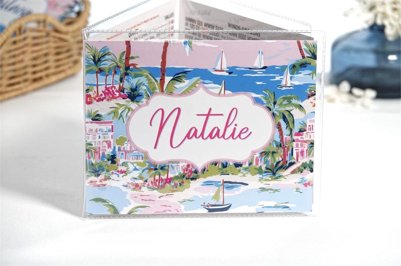 Personalized pink and blue Harbor View mahjong card cover with coastal waterfront homes, palm trees, sailboats, and optional clear sleeve for Large NMJL 2025 2026 card.