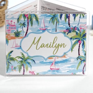 Personalized pink and blue Palm Beach mahjong card cover with palm trees, sailboats, coastal water scene, and optional clear sleeve for Large NMJL 2025 2026 card.