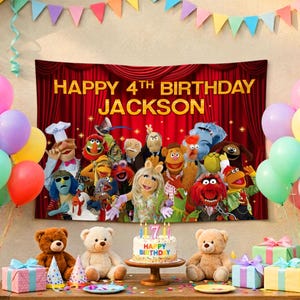 May include: A rectangular birthday backdrop featuring a red curtain background with the text HAPPY 4TH BIRTHDAY JACKSON and a large group of Muppet characters. The scene includes colorful balloons, three plush teddy bears, and gift boxes.