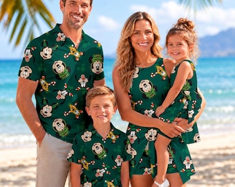 May include: A set of matching dark green clothing featuring a repeating pattern of Mickey Mouse, Goofy, and candy canes. The collection includes a short-sleeved collared shirt, a sleeveless dress, and a child's short-sleeved button-down shirt.