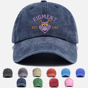 May include: A blue denim baseball cap with the text "FIGMENT EST 1983" and a purple dragon cartoon image.