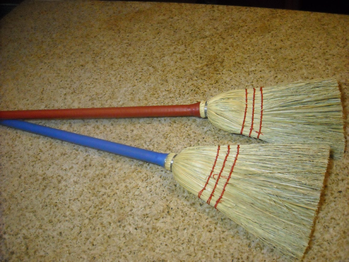 two kids size real brooms handmade sold in sets red and blue Etsy