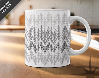May include: White ceramic mug with a repeating pattern of the words "THE ACTUAL WHAT FUCK" in a gradient of gray and black. The mug has a white handle and the text "Choose from TWO SIZES" in the upper left corner.