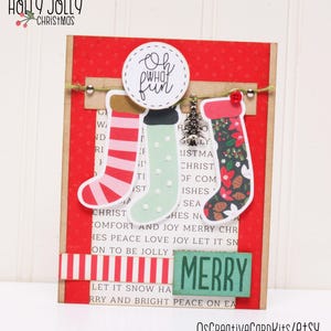 May include: A red and white striped paper with the words "HOLLY JOLLY CHRISTMAS" at the top.  The paper has a red background with white polka dots.  There are three Christmas stockings hanging from a string with a silver charm of a Christmas tree.  The stockings are red and white striped, green with white polka dots, and floral patterned.  The stockings are hanging from a circle with the words "Oh what fun" written in black.  The paper has the words "G HOLLY" and "CHRISTMAS" written in black.  The paper has the words "CHRIST COMFORT AND JOY MERRY CHR HES PEACE LOVE JOY LET IT SN ON TO BE JOLLY MERRY LET IT SNOW HA RRY AND BRIGHT PEACE ON EA" written in black.  There is a green and white striped paper with the word "MERRY" written in black.
