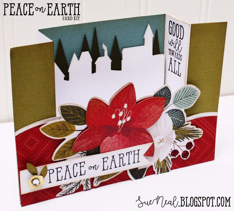 May include: A red and green Christmas card with a poinsettia flower, a white banner with the text "Peace on Earth", and a cityscape silhouette with the text "Good will towards all".