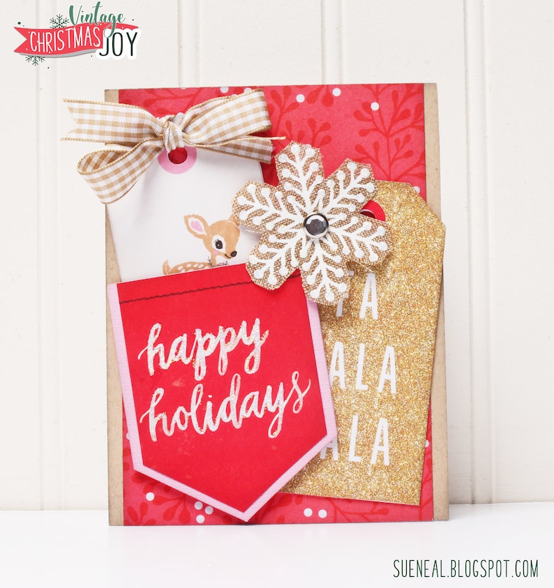 May include: A red and gold Christmas card with a snowflake, a deer, and the text "happy holidays" and "A LA LA".