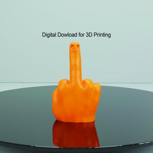 May include: Orange 3D printed model of a middle finger with a smiling face on the index finger. The model is on a black surface. Digital Dowload for 3D Printing.