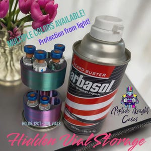 May include: A multi-coloured vial storage unit holding small vials with blue caps, next to a can of Barbasol shaving cream. The image includes the text "Multiple Colors Available!" and "Hidden Vial Storage". The shaving cream can is 312g.