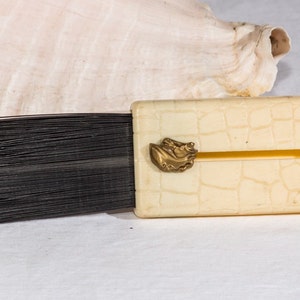 Vintage travel fold in brush plastic horse