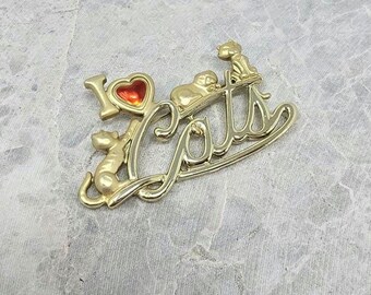 Spilla vintage AJC color oro con raffigurazione di un gatto per San Valentino.