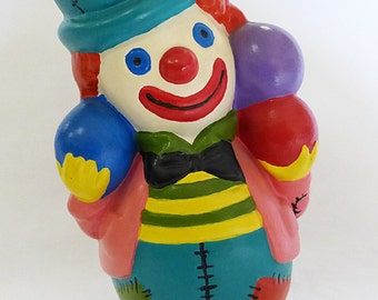 Clown musicien en porcelaine, hauteur 18 cm, bon état général