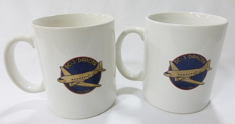 DC-Dakota white coffee mug memorabilia advertising set of 2 image 1