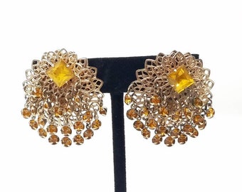 Vintage gold tone filigree Citrine rhinestone clip earrings mid century