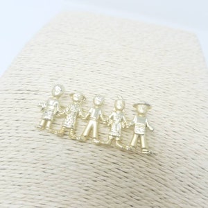 Vtg AJC brooch pin children kids of the world nations unity gold tone signed