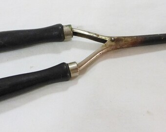 Vintage rustic primitive hair curling iron and black wood handle