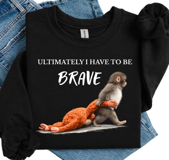 Punch the Monkay Graphic Sweatshirt, Baby Monkey Plush Toy Design, Animal Lover Apparel