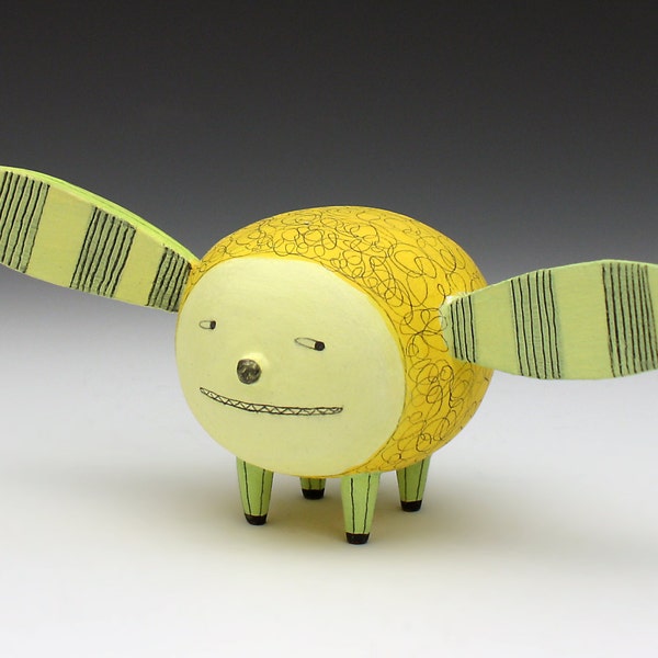 Silly yellow dog with lime legs
