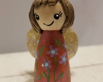 The Butterfly Fairy Peg Doll with Glittering wings.