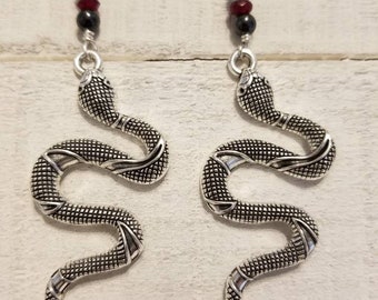 Snake charm earrings with sterling silver earwires and semiprecious stones.