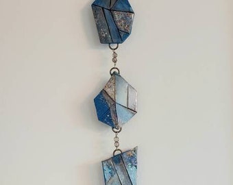 The Blue Lapis Lazuli inspired Gem Crystal Hand sculpted wall Art sculpture with Austrian Crystals and Raw Smoky Quartz drop.
