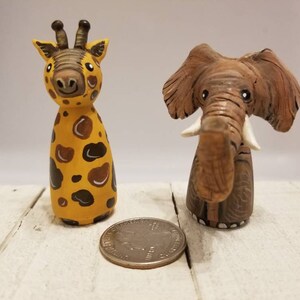 The handpainted / Sculpted  Peg Doll Safari Set - The Happy Giraffe and Elephant.
