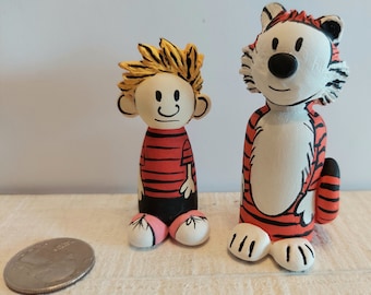 The Calvin and Hobbes Peg Doll Set