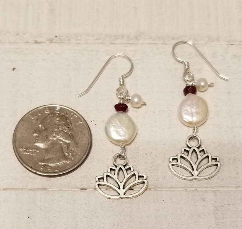 Blooming lotus flower drop earrings with garnets and fresh water pearls.