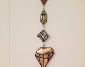 The Various sized Crystal Gem art hand sculpted wall hanging.