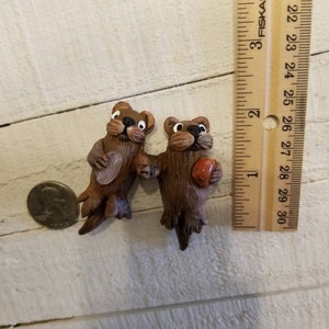 The Two Cute back floating Hand sculpted /painted Sea Otter Peg Dolls Holding Paws with Natural Tumbled Crystal Stones. image 3