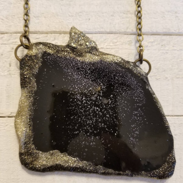 Black Agate slab amulet necklace enhanced with resin and silver glitter with faceted pyrite.