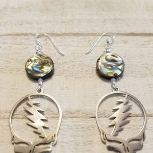 Grateful Dead Steal Your Face Charm drop earrings with Abalone shells with sterling ear wires.